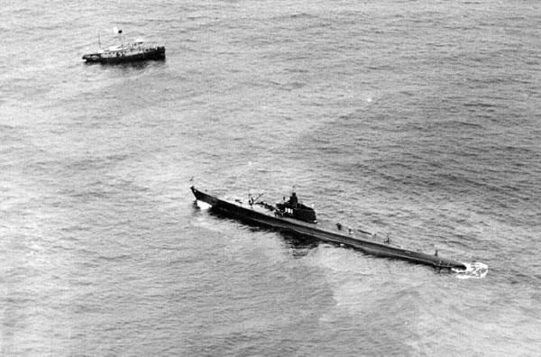 USS Sculpin stanging over USS Squalus